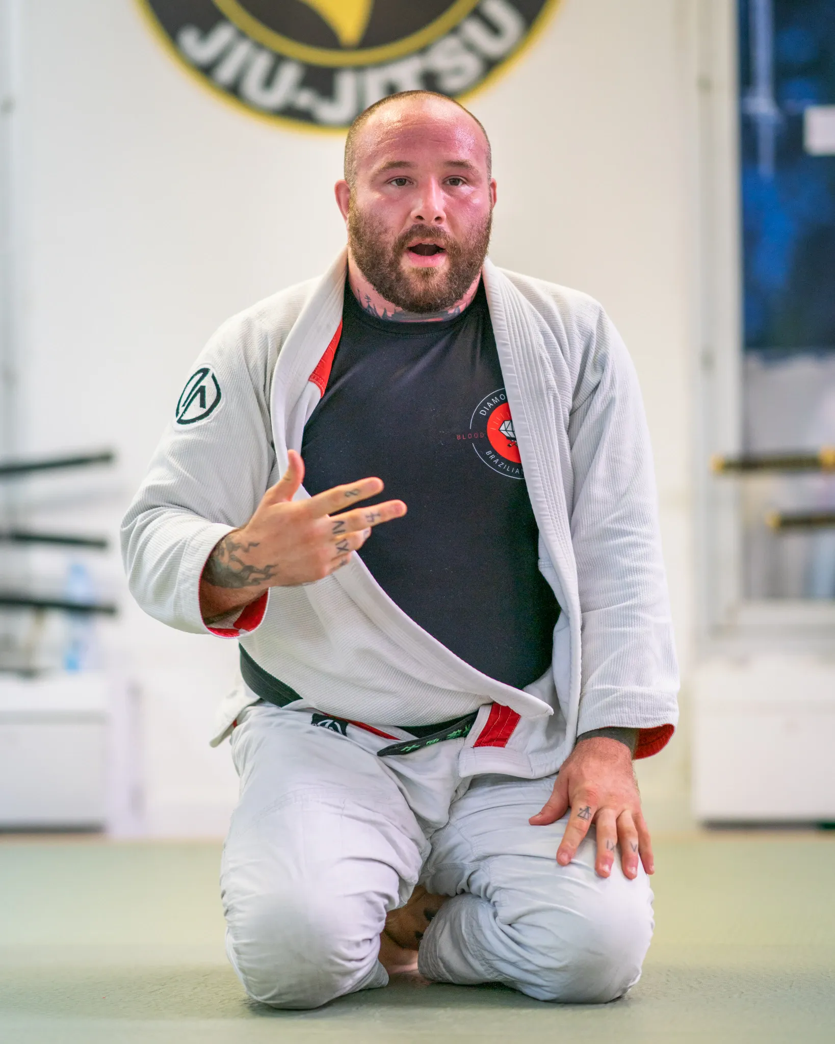 Method Jiu-Jitsu instructor coaching students on the mat in Tulsa
